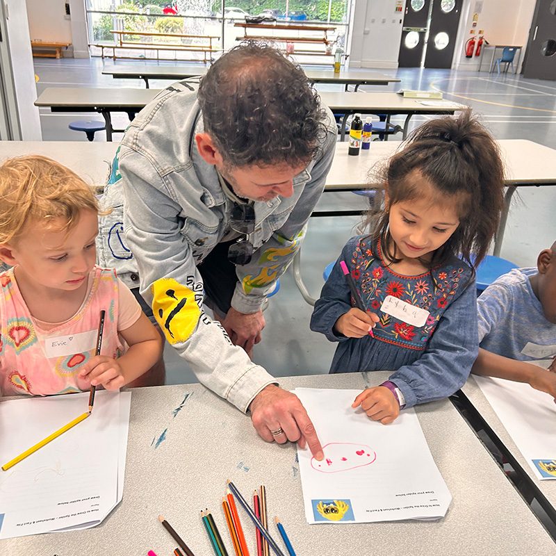 Teacher-Helping-Students-2